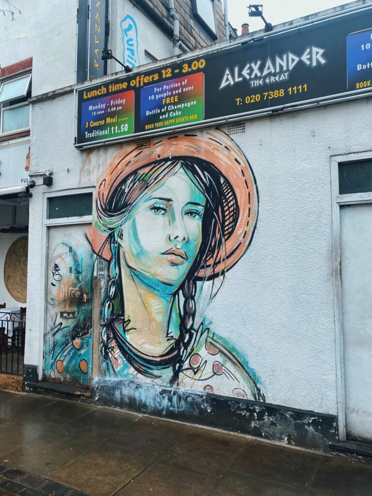 Mural by Alice Pasquini in Camden