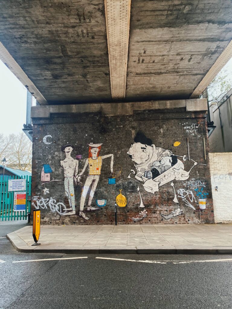 Mural underneath a bridge on Castlehaven Road in Camden