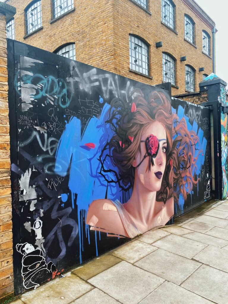 Mural by Irony on Hawley Mews in Camden
