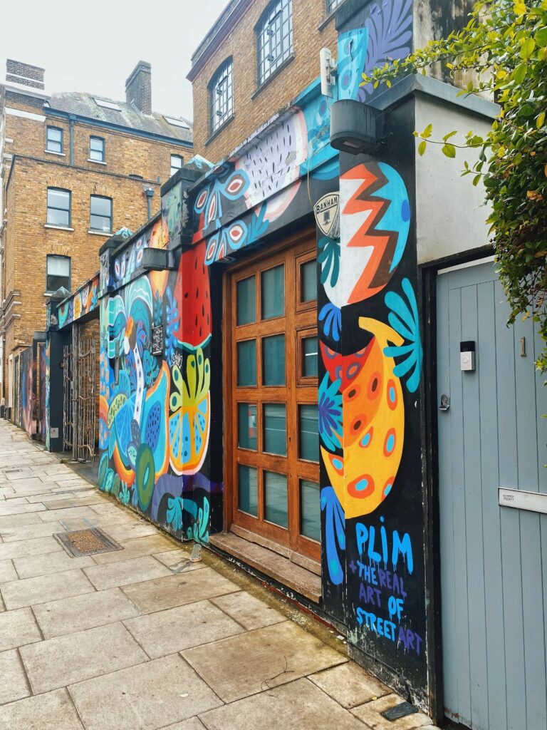 Street art by Plim on Hawley Mews in Camden