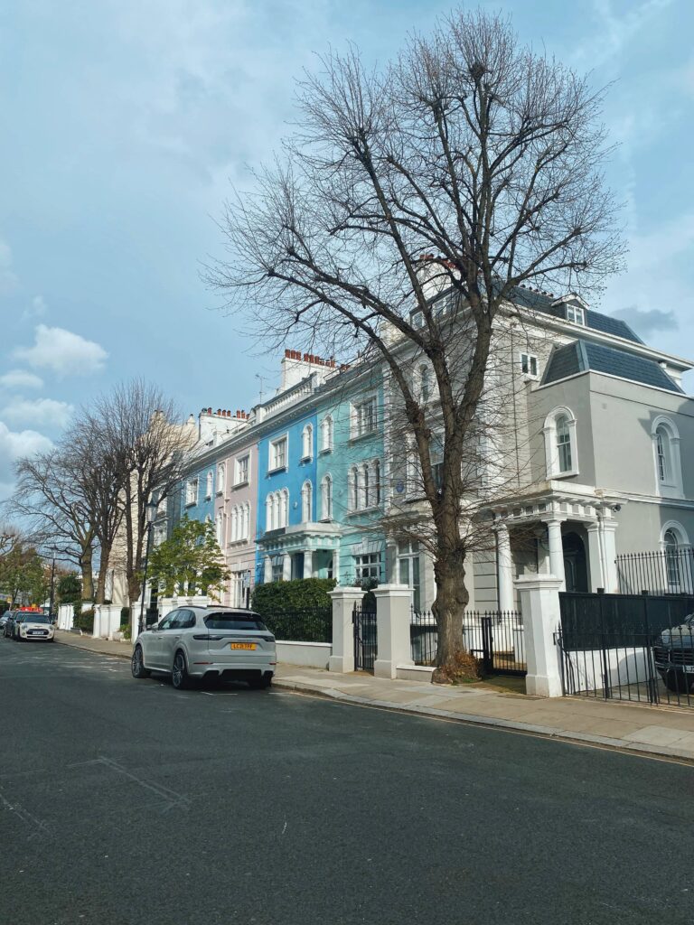 A block of colourful houses at Elgin Crescent, Notting Hill