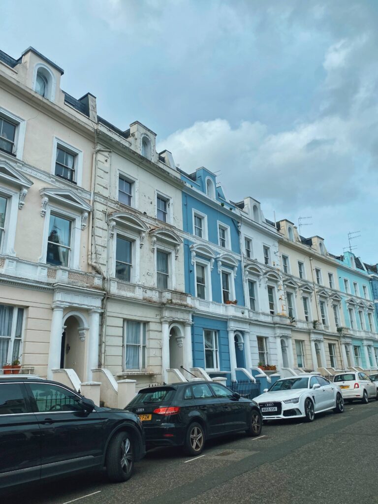 A row of colourful houses on Ladbroke Crescent, Notting Hill