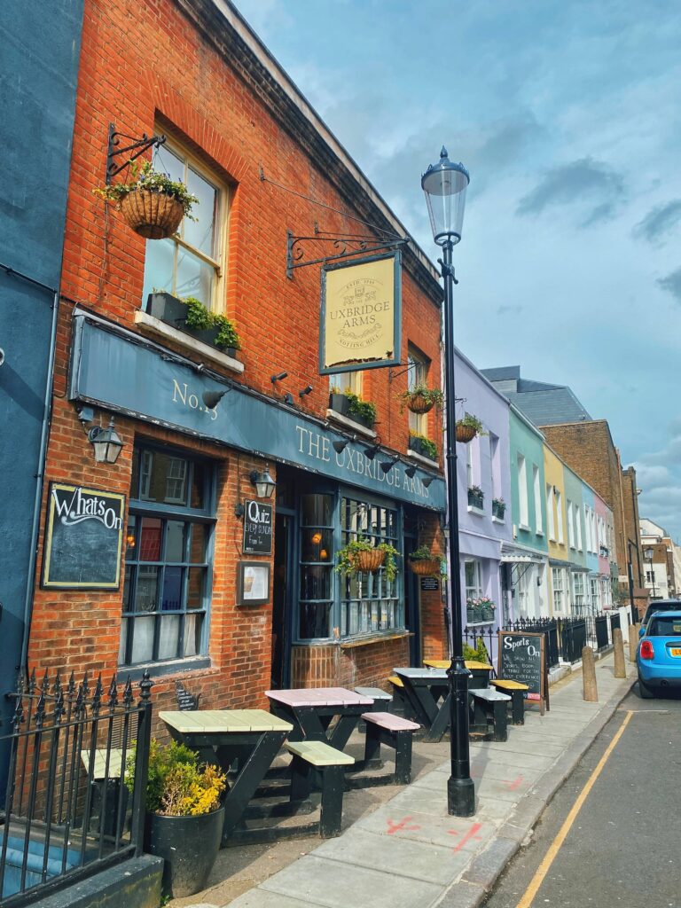 The Uxbridge Arms and rows of colorful houses on Uxbridge Street, Notting Hill