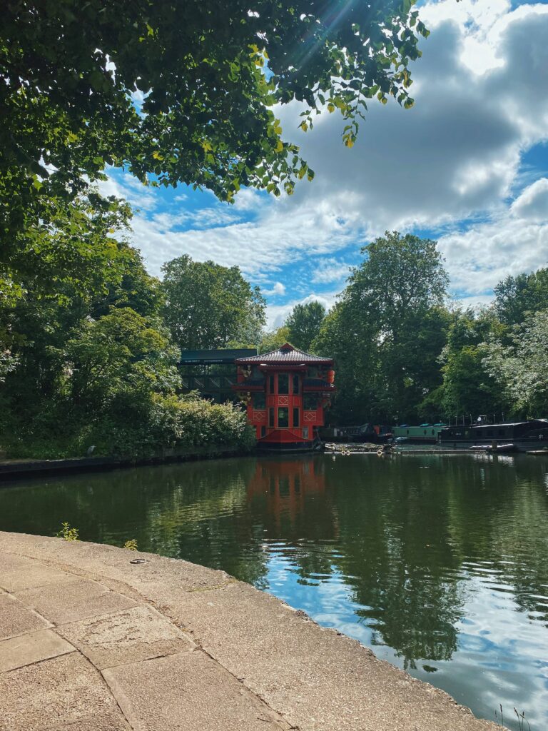View of Cumberland Basin from Regent's Canal Towpath and the red floating restaurant, Feng Shang Princess