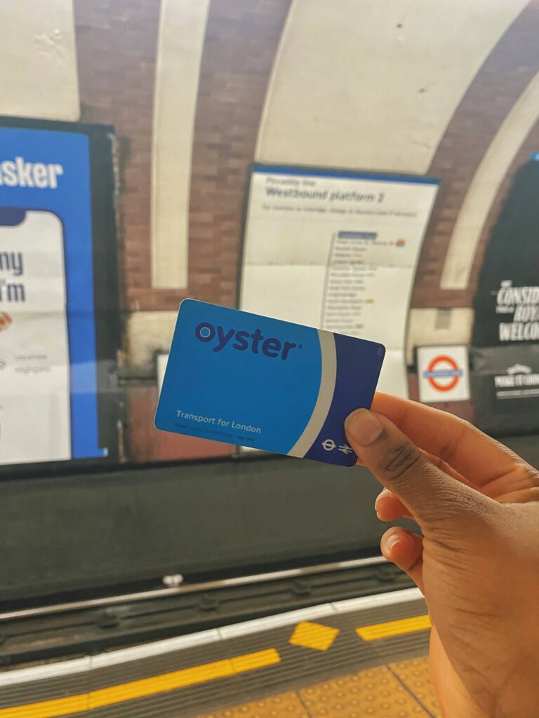 Abigail holding the Transport for London Oyster Card