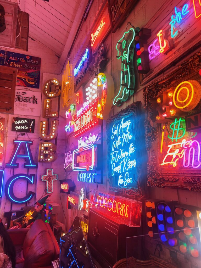 Neon art on the walls of God's Own Junkyard in London
