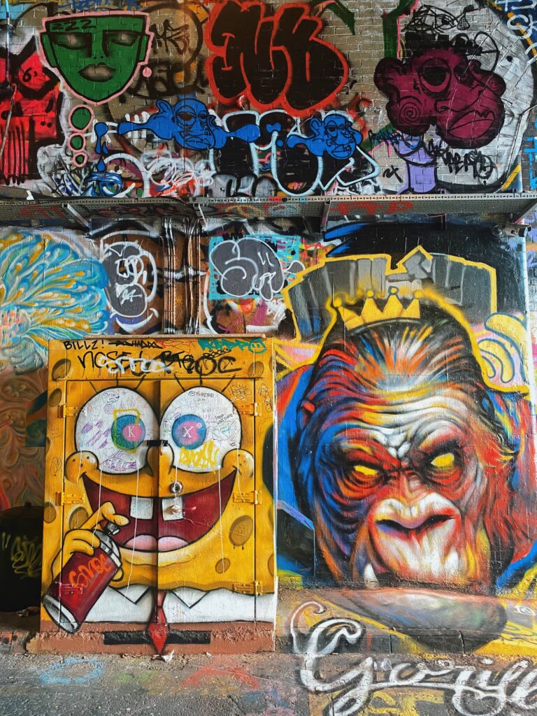 Graffiti art of SpongeBob SquarePants and a gorilla at the Graffiti Tunnel in London