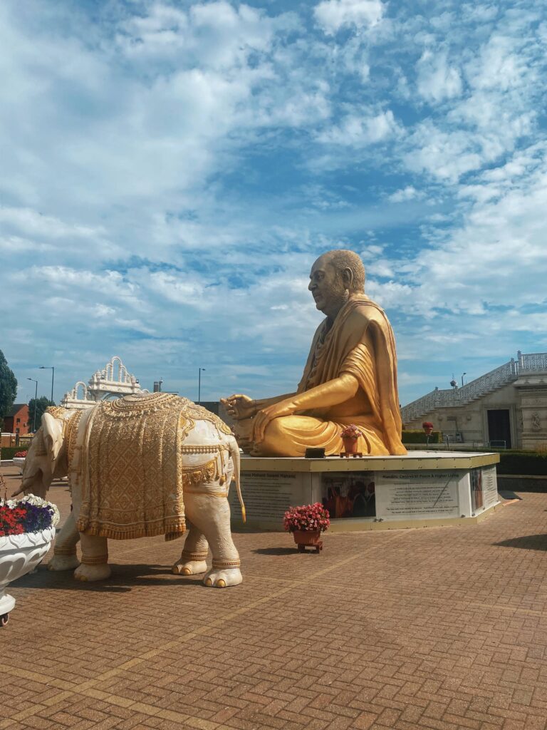 Golden statues at Neasden Temple in London